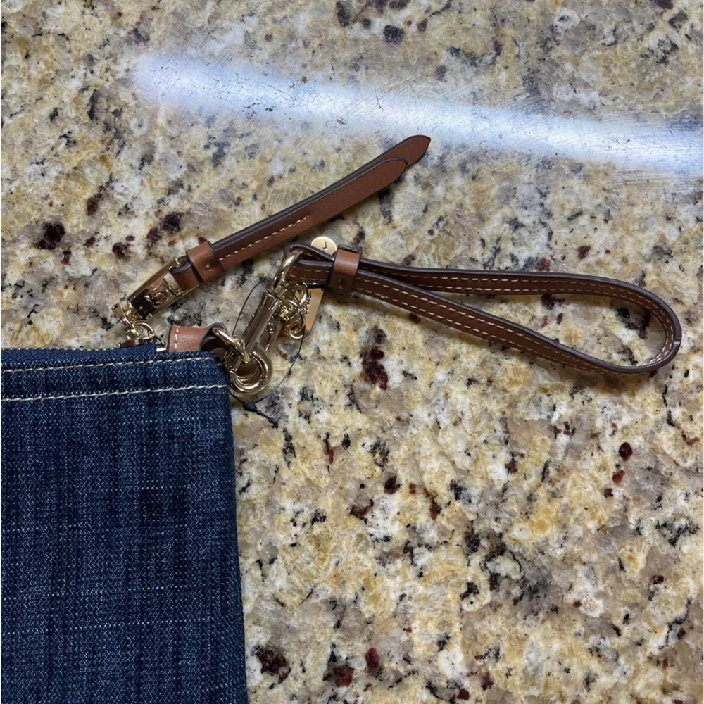 True Religion Wristlet with Tan Trim